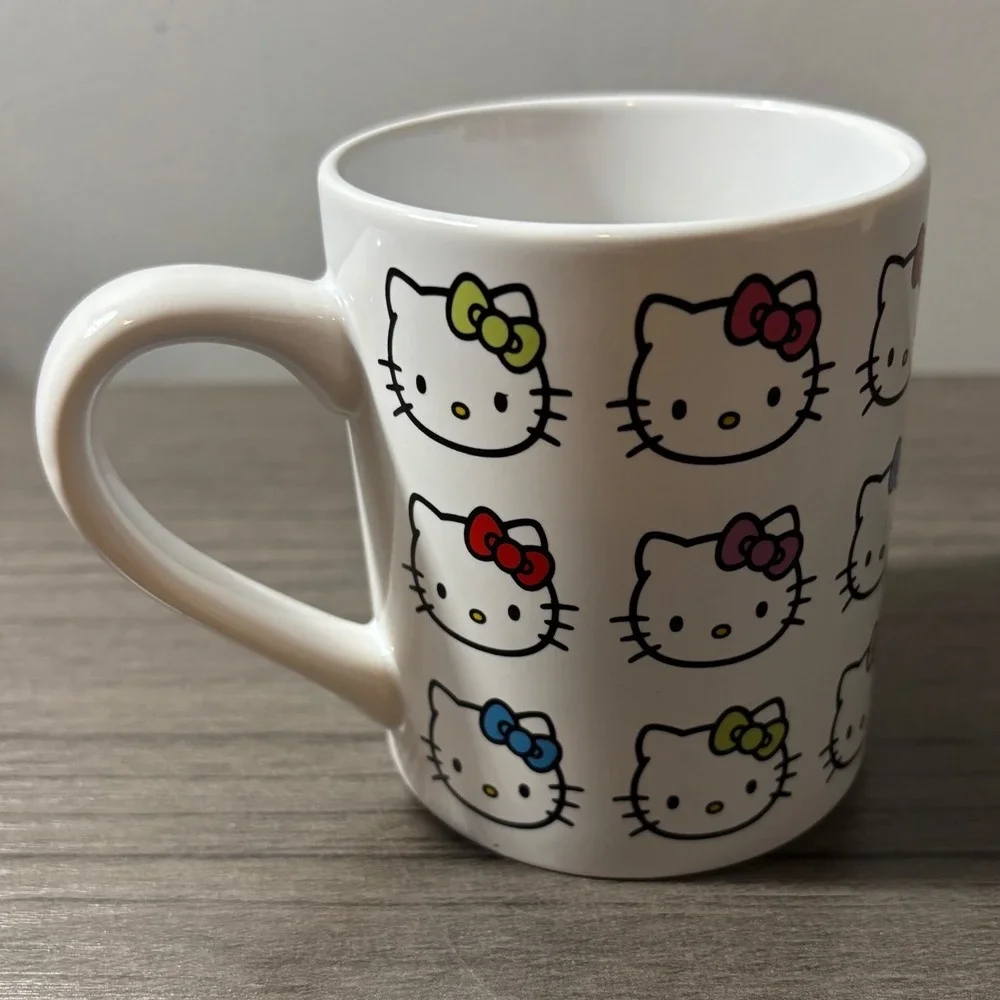 Sanrio Hello Kitty Coffe Mug White with Multiple Hello Kitty Faces 14oz Ceramic